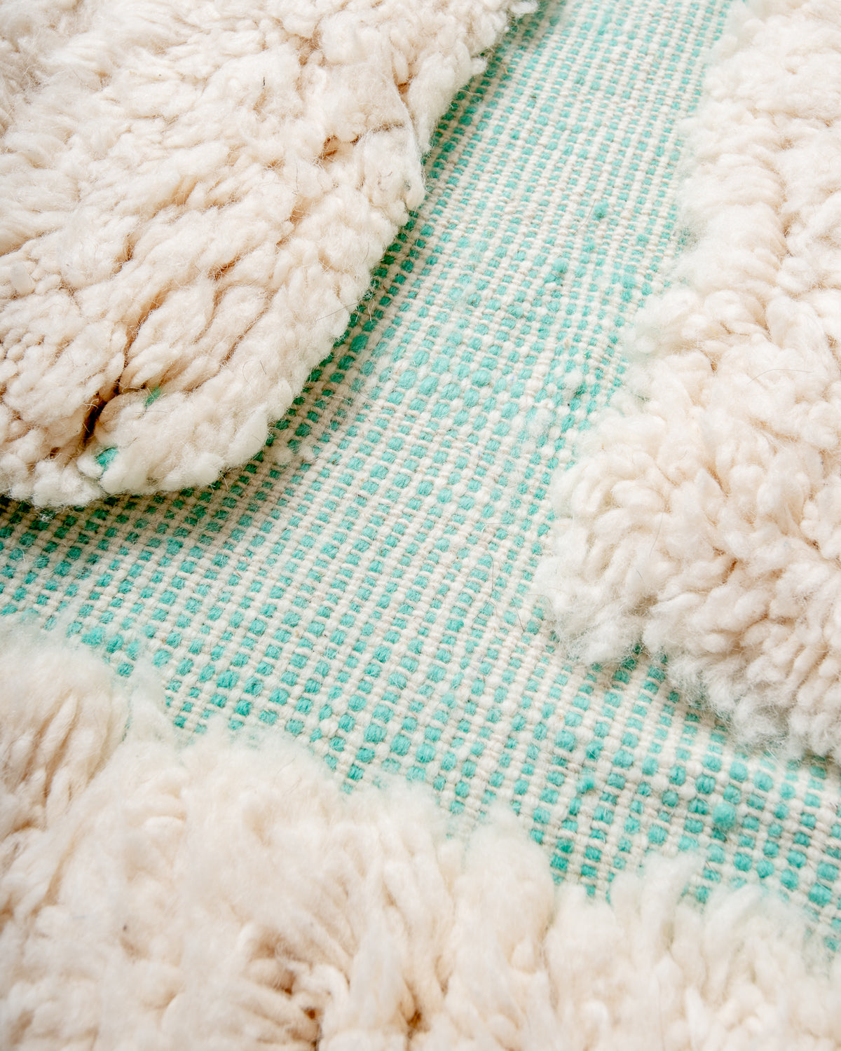 Modern, designer, handcrafted Berber rug from Morocco. Beniourain carpet with beautiful colours and patterns and fluffy wool texture.